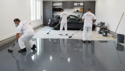 Professional epoxy garage floor coating in Ogden, UT providing durable, glossy finish for homeowners